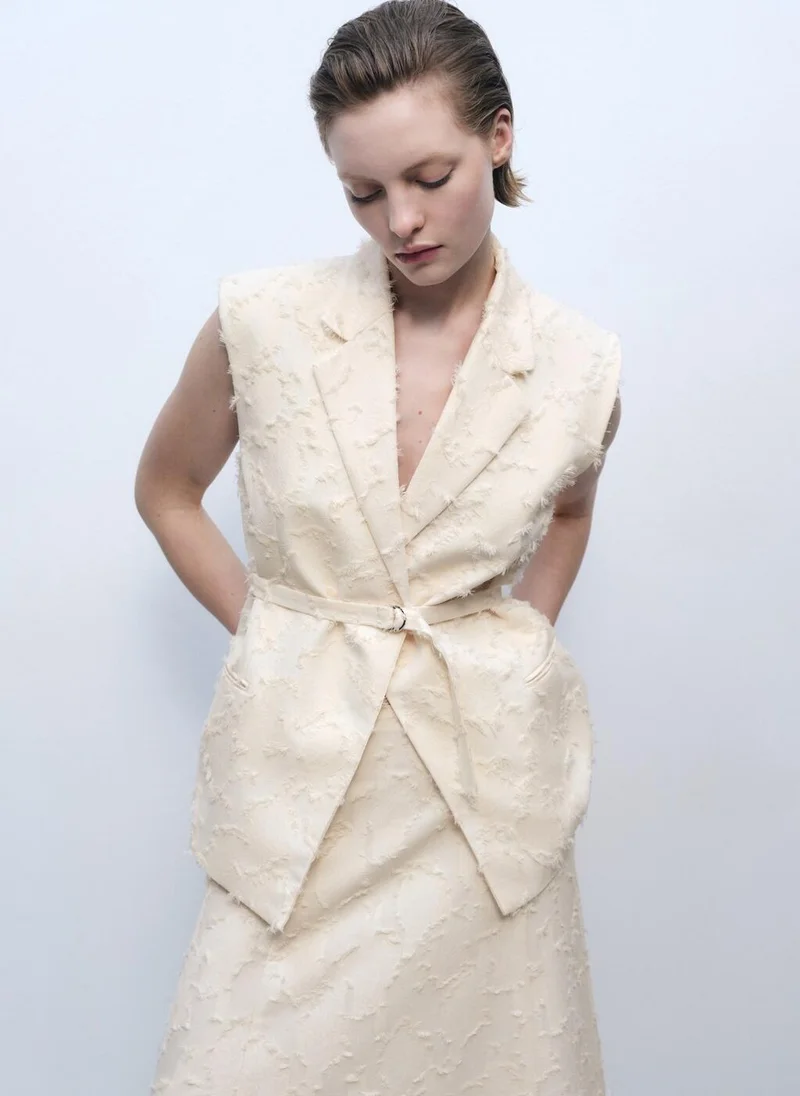 مانجو صدرية بخصر بحزام